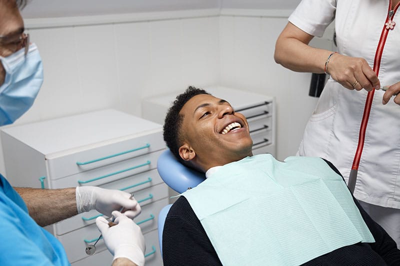 Man smiling in dentist chair